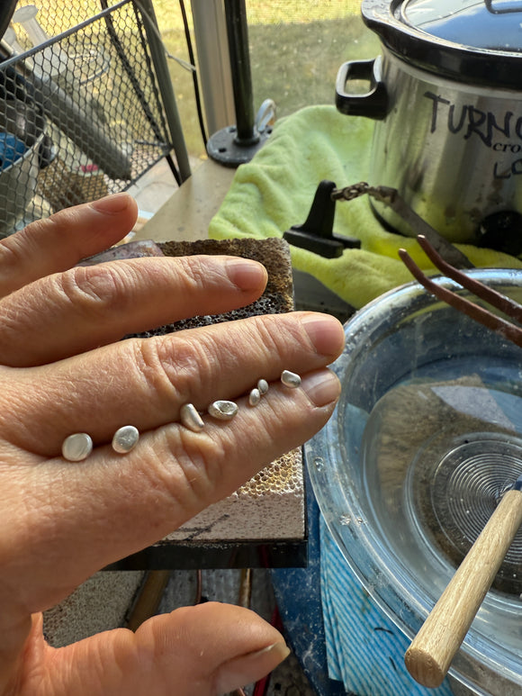 DK | water caste earrings