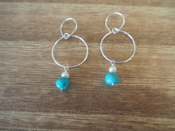 Argentium silver, handmade circle with dangling pearl and turquoise. Handmade earwire.  